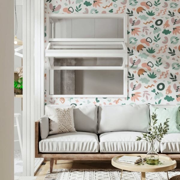 Papier peint adhésif sur mesure avec motif géométrique rose posé dans un salon en Tunisie.