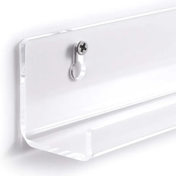 etagere-murale-plexiglas-transparente-tunisie.jpg Étagère murale en plexiglas transparente, design flottant pour rangement livres ou cadres, fixation murale invisible.