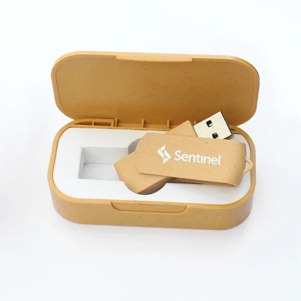Clé USB beige moucheté en paille de blé avec son coffret de rangement écologique.